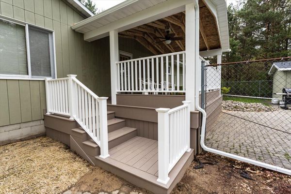 Here we built a new deck as well as a roof overhead to enjoy even in the rain!
