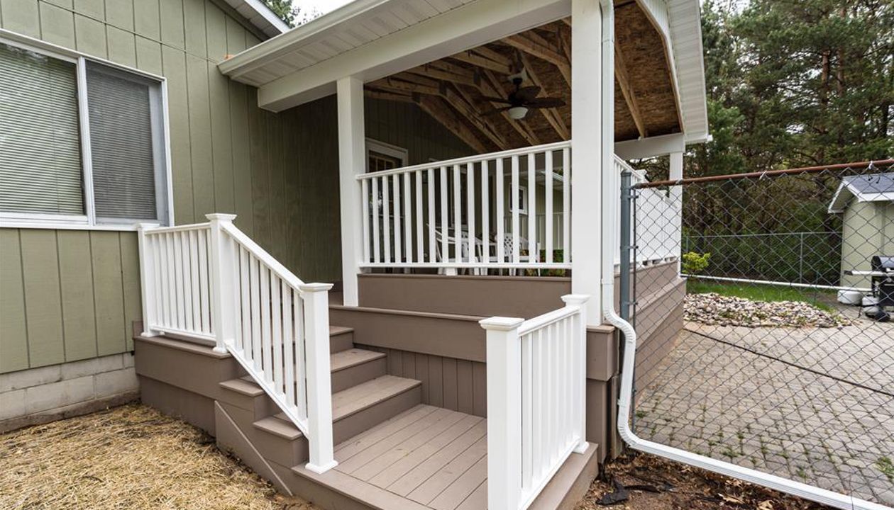 Here we built a new deck as well as a roof overhead to enjoy even in the rain!