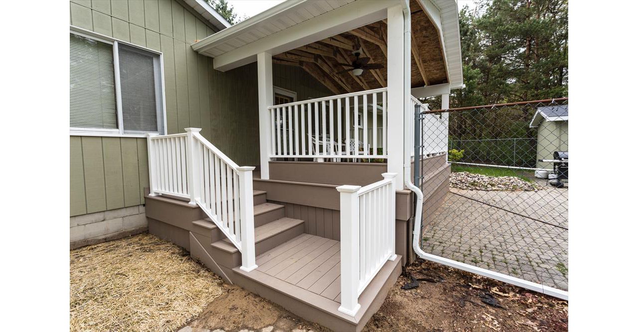 Here we built a new deck as well as a roof overhead to enjoy even in the rain!