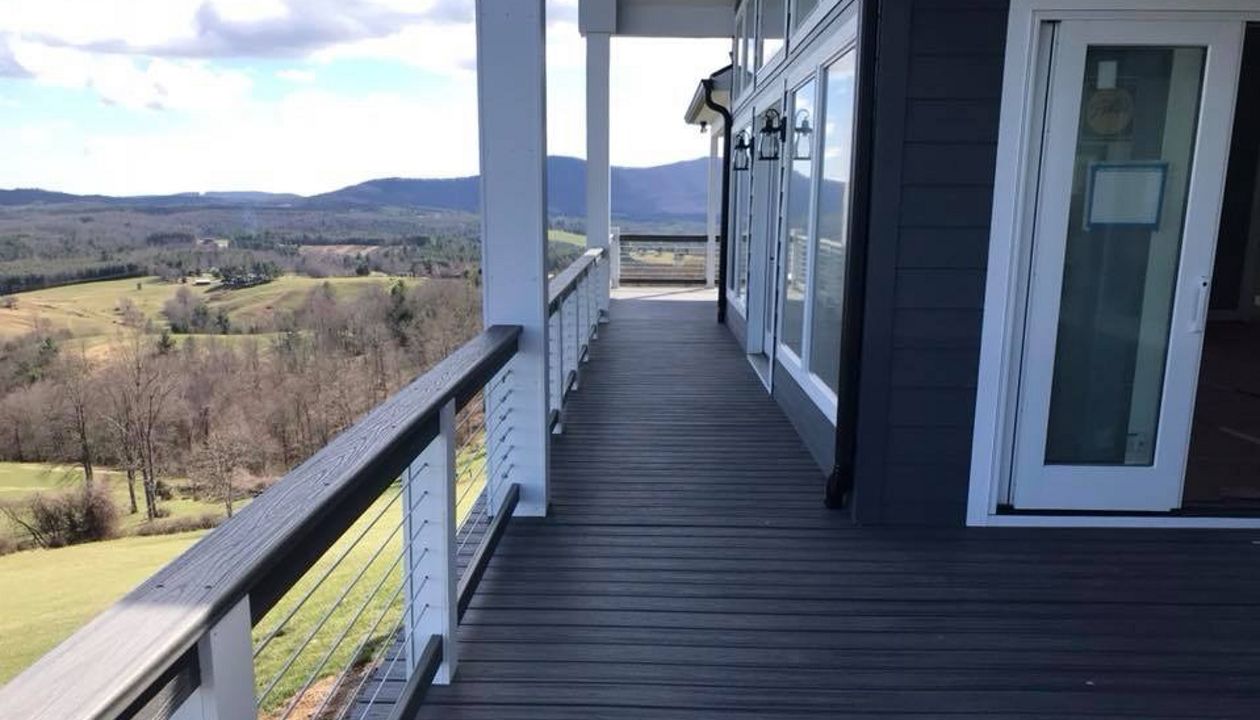 Trex Transcend Island Mist decking goes well with the siding and trim colors