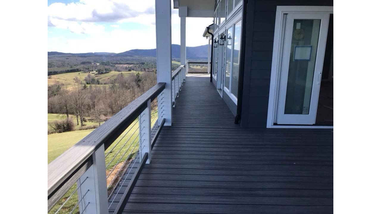 Trex Transcend Island Mist decking goes well with the siding and trim colors