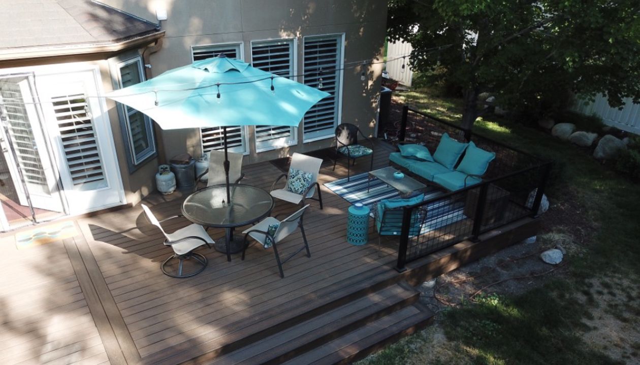 Trex Spiced Rum with Black Signature mesh Aluminum Railing near Draper, UT