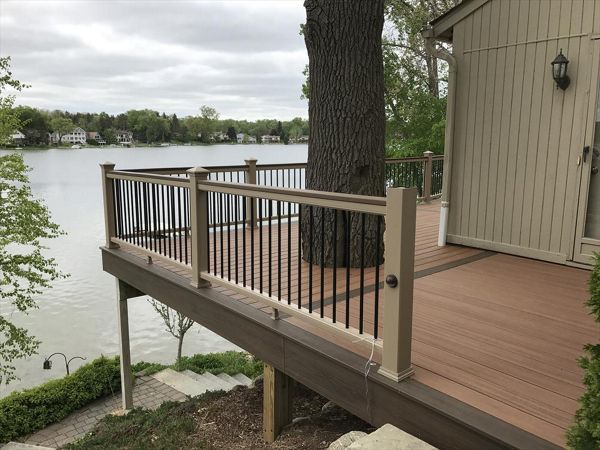 Check out this custom Trex deck Images built out of Tiki Torch / Spiced Rum decking accentuated by Rope Swing railing in West Bloomfield, MI.