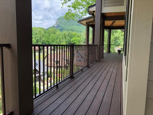 Trex Transcend Lava Rock walkway with Trex Signature Bronze railings will keep beautiful no matter the weather