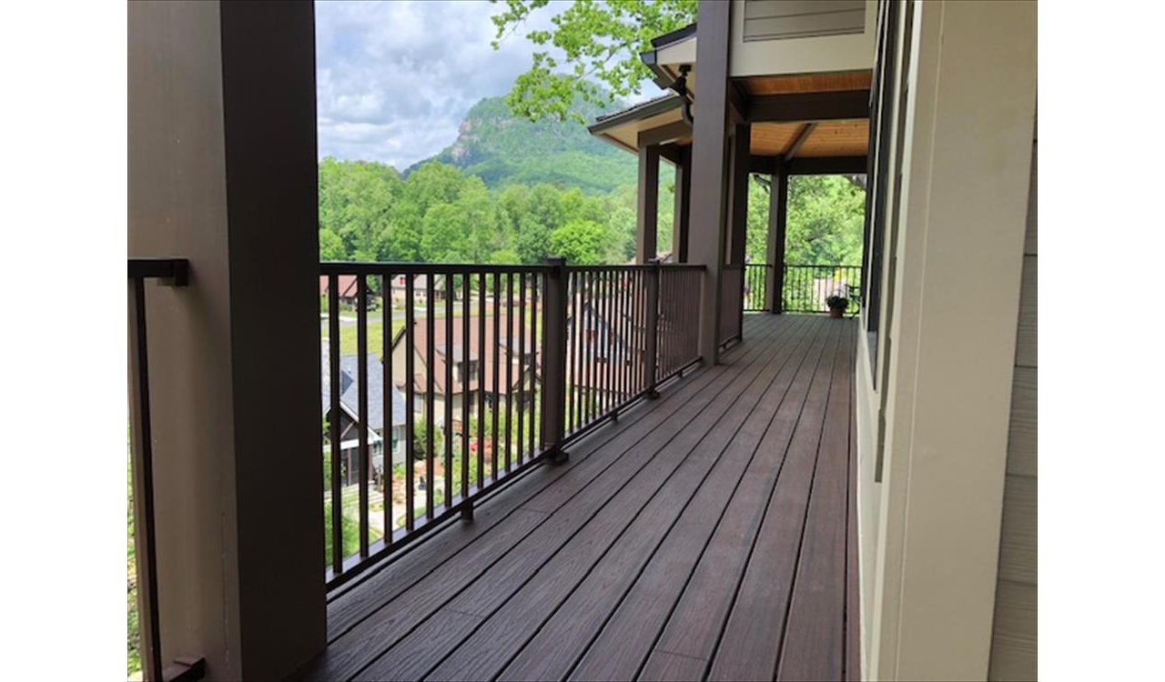 Trex Transcend Lava Rock walkway with Trex Signature Bronze railings will keep beautiful no matter the weather