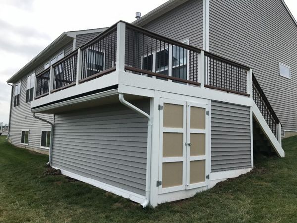 Trex Deck with Rain Deck, Under Deck Storage, and Trex Transcend Cocktail Rail.