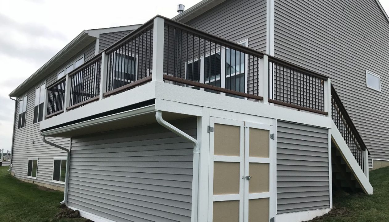 Trex Deck with Rain Deck, Under Deck Storage, and Trex Transcend Cocktail Rail.