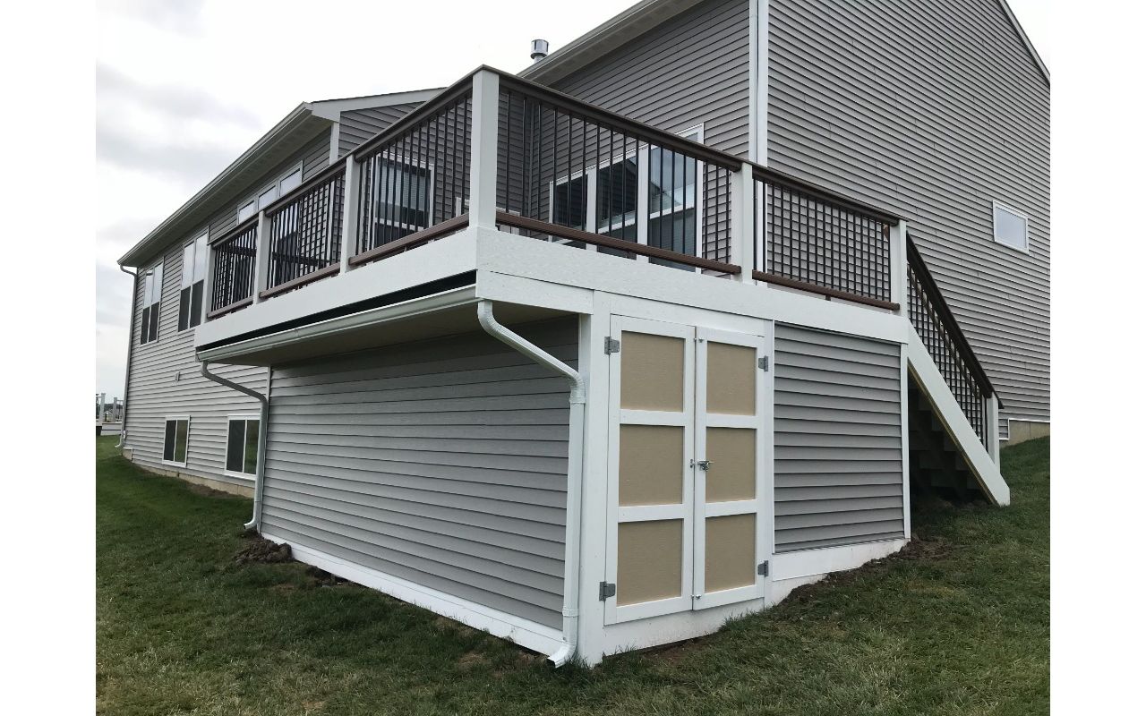 Trex Deck with Rain Deck, Under Deck Storage, and Trex Transcend Cocktail Rail.