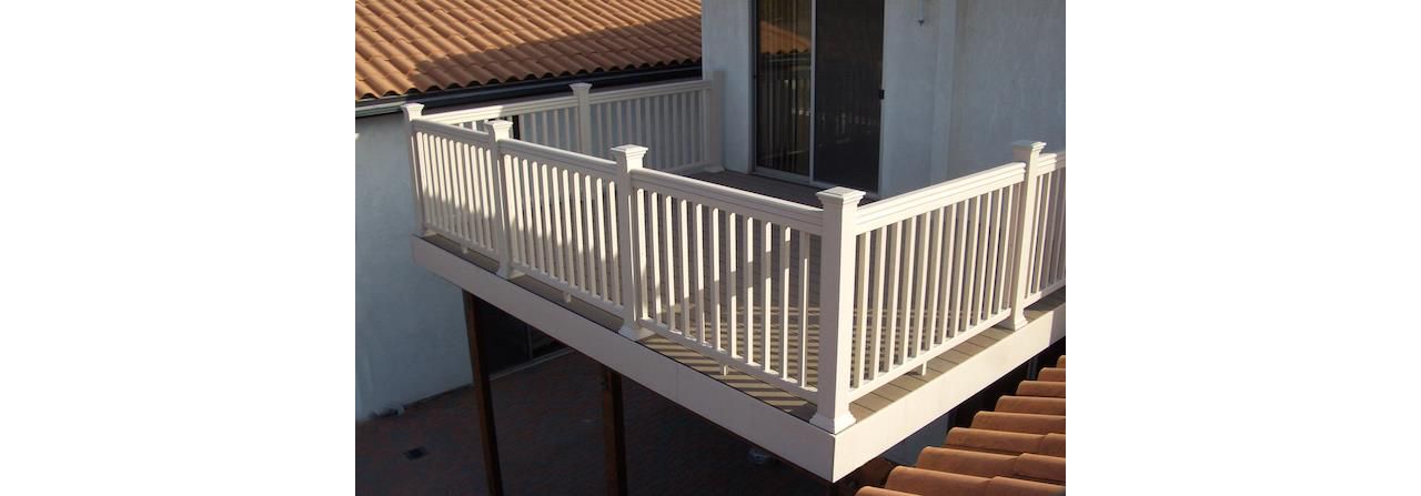 Composite Trex Deck with white handrails and facia