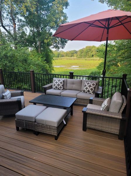 Havana Gold decking with Vintage Lantern border and fascia. Signature black rail with Vintage Lantern posts. West Bloomfield, Michigan