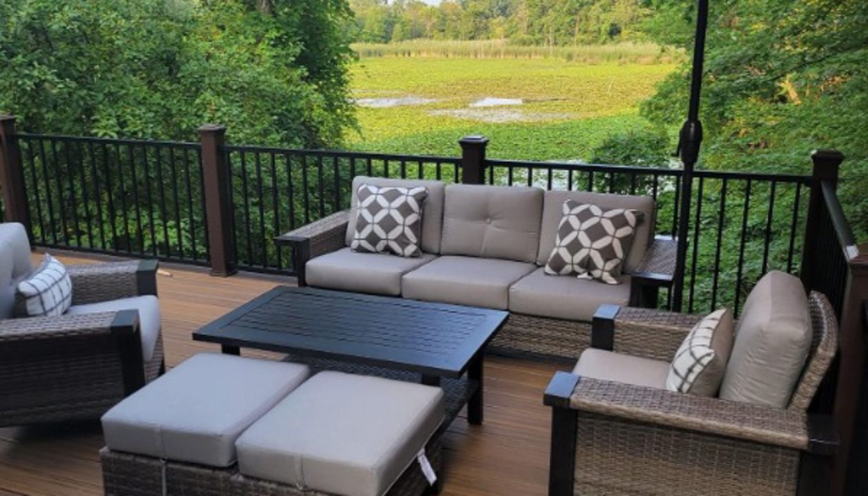 Havana Gold decking with Vintage Lantern border and fascia. Signature black rail with Vintage Lantern posts. West Bloomfield, Michigan