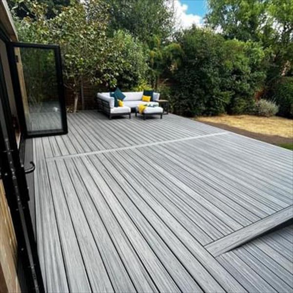 Trex transcend island mist decking, picture framed with a breaker board through the main field. Wheel chair access ramp with a full width steps with fascia lighting. Location Ipswich, Suffolk