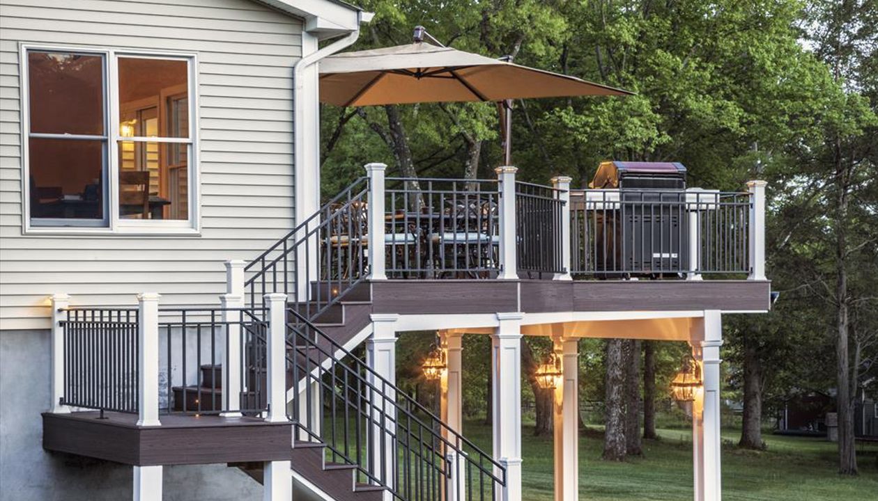 Trex Lava Rock decking and fascia pull double duty on this stunning split-level staircase in Bridgewater, N.J., providing a solid, unified look to this outside entertainment area.