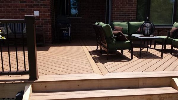 Tiki torch deck with vintage lantern rail