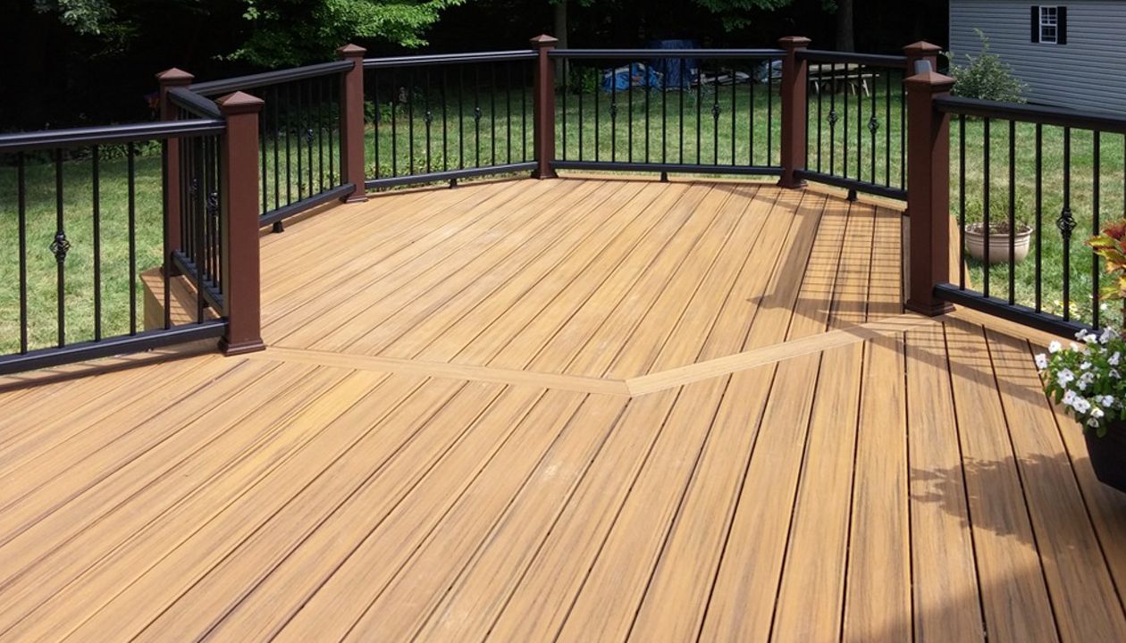 Trex Transcend Havana Gold Composite Deck boards with Trex Composite Vintage Lantern Post with decorative balusters