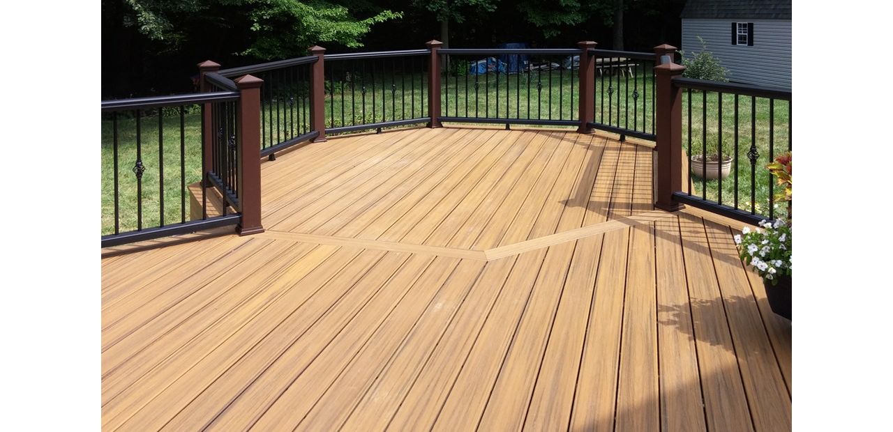 Trex Transcend Havana Gold Composite Deck boards with Trex Composite Vintage Lantern Post with decorative balusters