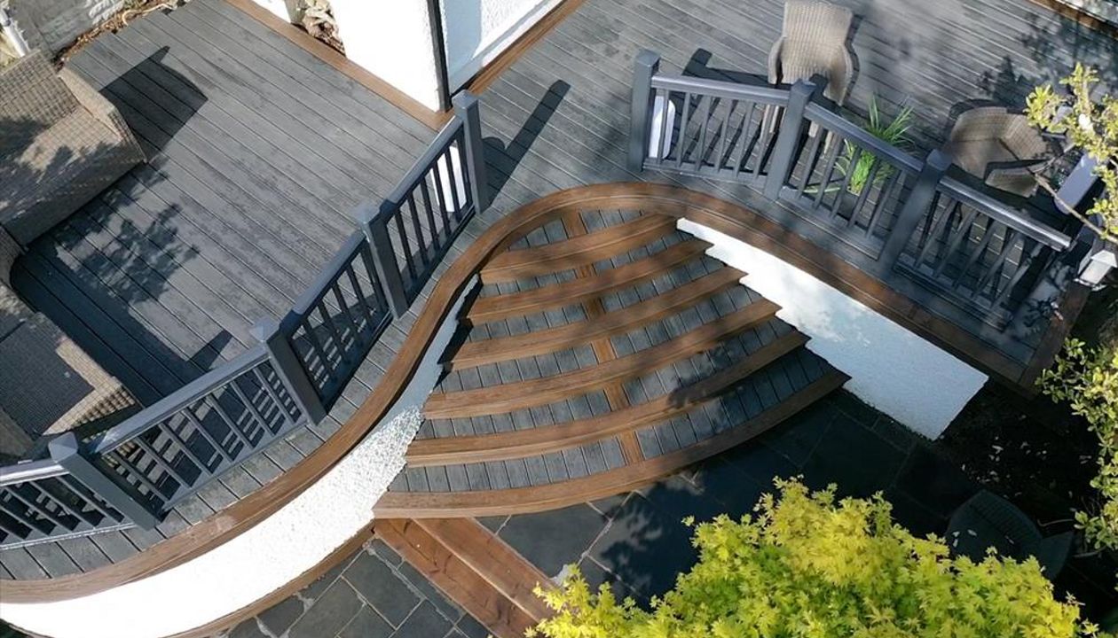 Trex Enhance Naturals Calm Water field with Trex Transcend boarder Spiced Rum fitted at Carmarthen .