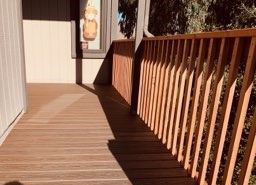 Trex Transcend Tropicals Spiced Rum with redwood railing