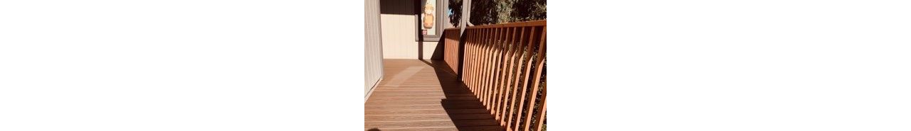 Trex Transcend Tropicals Spiced Rum with redwood railing