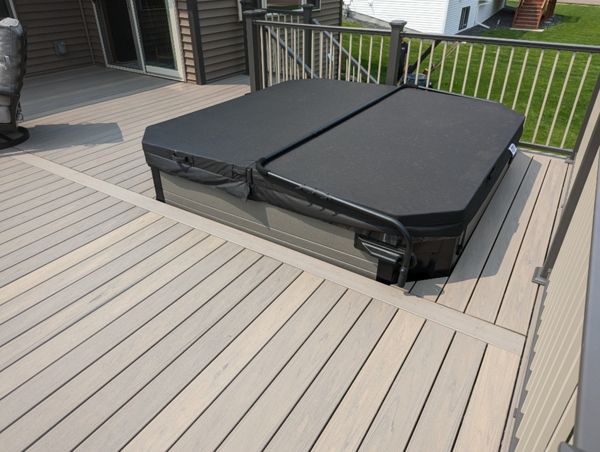 Trex composite lineage decking, Biscayne in color, aluminum railing.