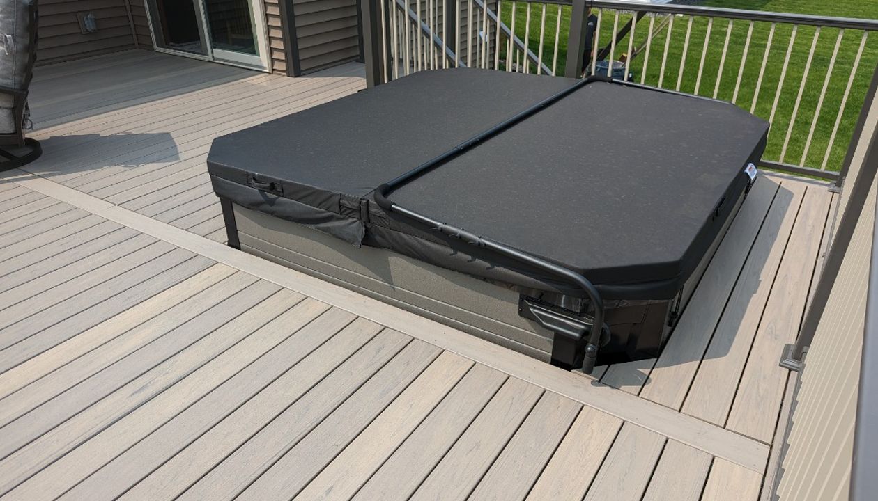 Trex composite lineage decking, Biscayne in color, aluminum railing.