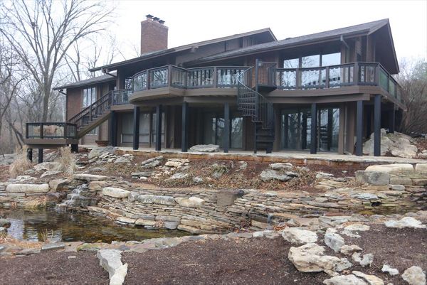 Custom Trex Deck with Curved Decking and Spiral Stairs