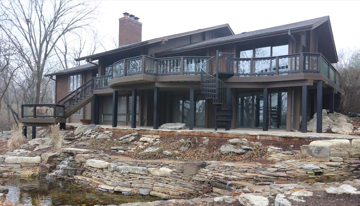 Custom Trex Deck with Curved Decking and Spiral Stairs