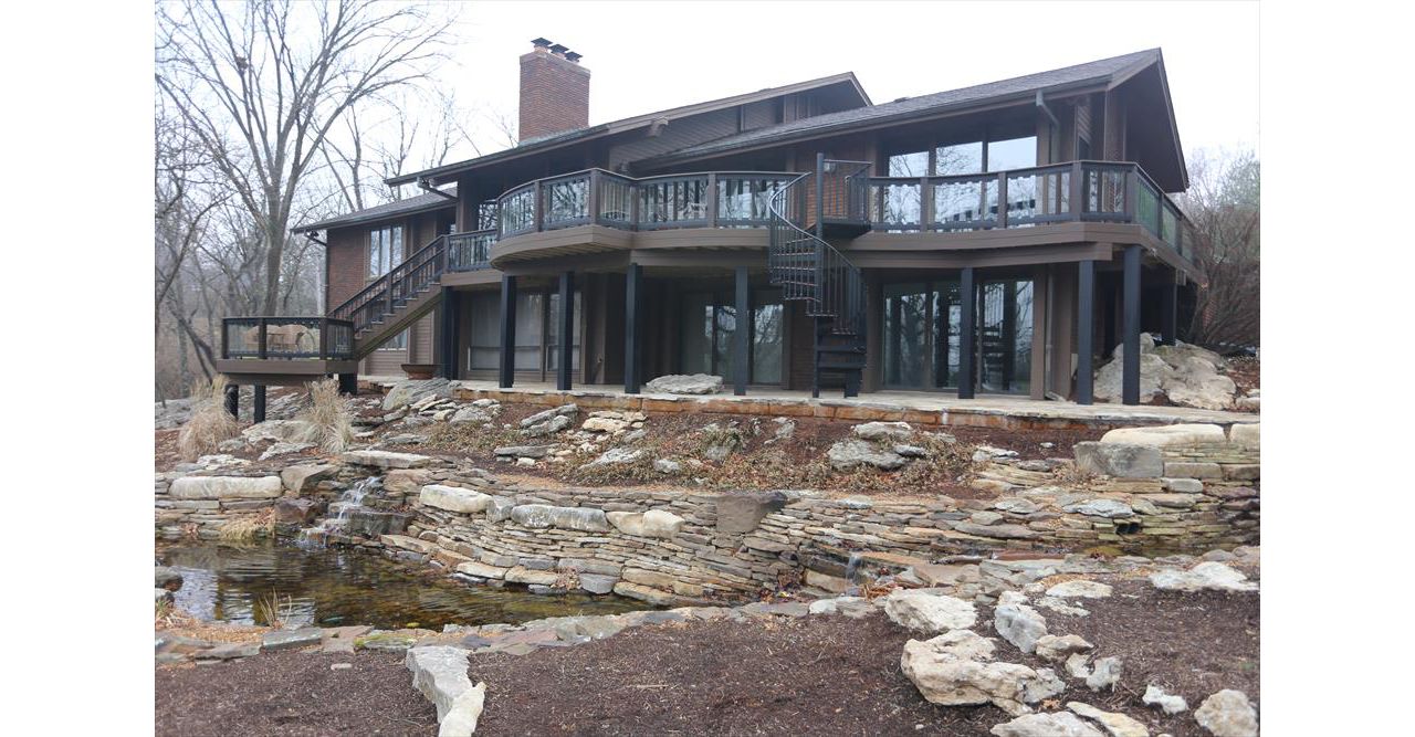 Custom Trex Deck with Curved Decking and Spiral Stairs