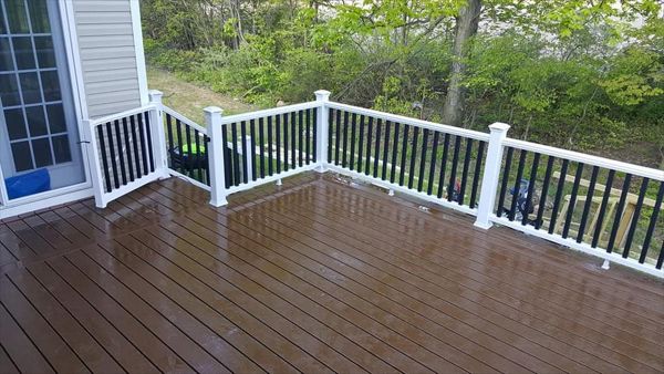 Transcend railing with black balusters and deck lighting