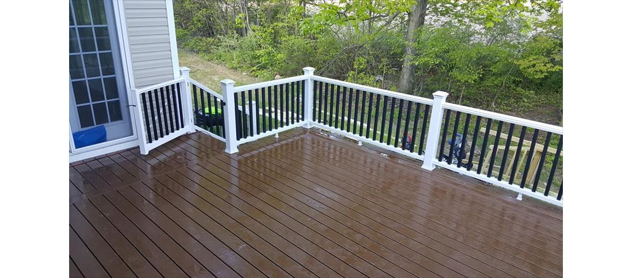 Transcend railing with black balusters and deck lighting
