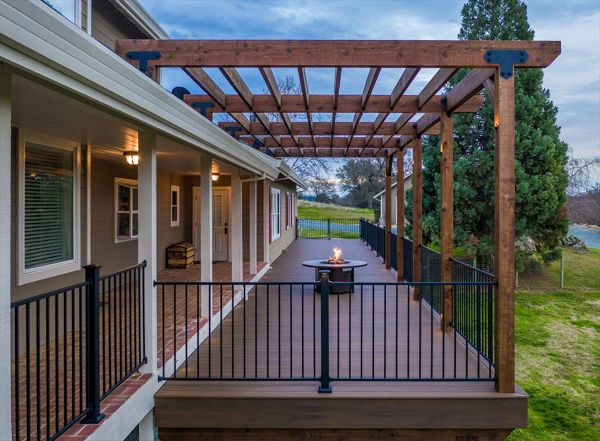 Spiced Rum Decking and rough redwood pergola