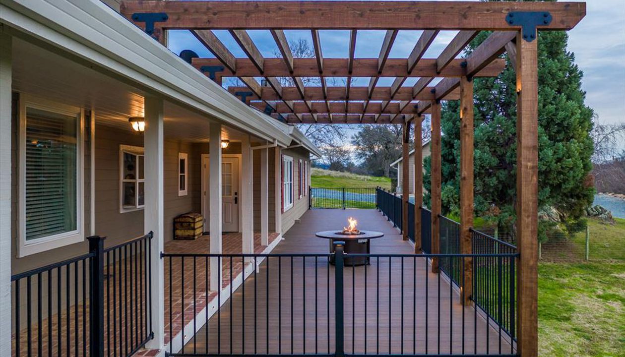 Spiced Rum Decking and rough redwood pergola