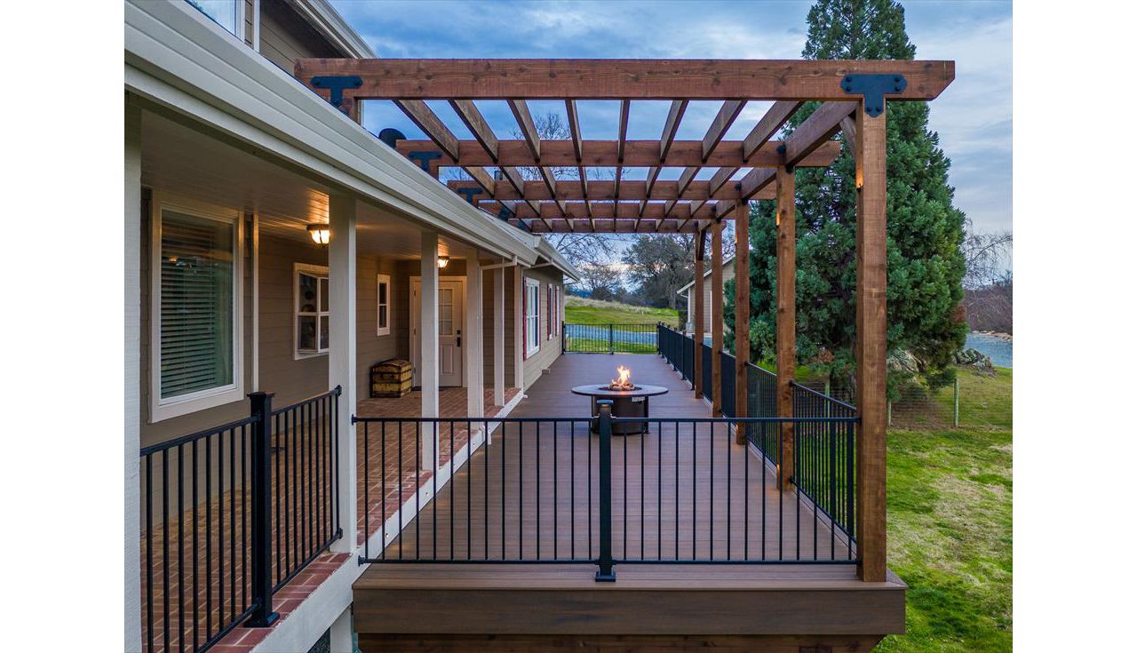 Spiced Rum Decking and rough redwood pergola