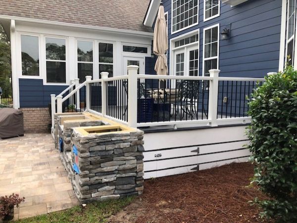 Trex Select Pebble Grey deck with Winchester Grey picture frame & Select Classic White Railing is the star of this outdoor living space in St. James, NC!!