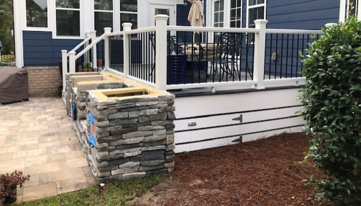 Trex Select Pebble Grey deck with Winchester Grey picture frame & Select Classic White Railing is the star of this outdoor living space in St. James, NC!!