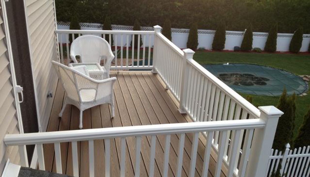 Spiced Rum Decking.  White Rail with Post Cap Lights