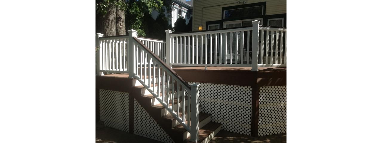 White Trex Transcend Railings With Vintage Lantern Capping