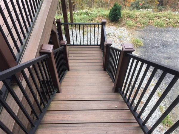 This beautiful set of Trex Transcend Spiced Rum stairs & Trex Signature rails are safe no matter the weather outside.