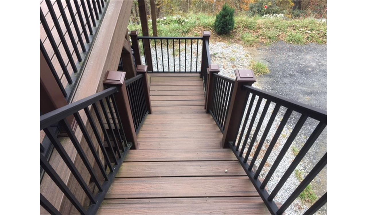 This beautiful set of Trex Transcend Spiced Rum stairs & Trex Signature rails are safe no matter the weather outside.