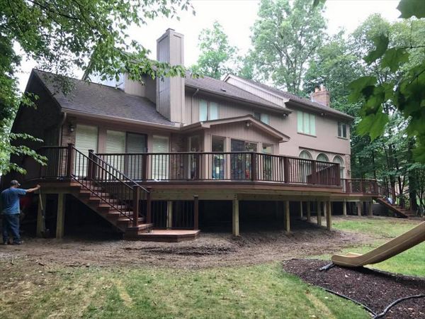 TREX Tiki Torch deck with Bronze Signature rail and cocktail top " OVER 1000 SF! "