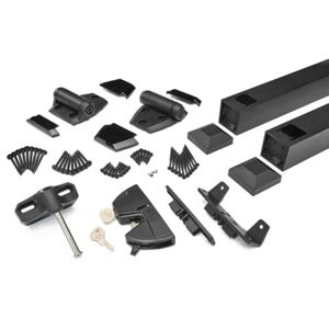 Image of a complete black gate hardware kit laid out on a white background. The set includes long rectangular rails, hinges, brackets, latches, and decorative caps. A lock mechanism with two metal keys is visible among the parts. The components are neatly arranged to show the variety of pieces included in the kit.