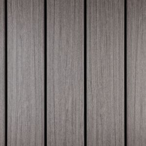 The image shows a close-up view of gray wooden panels arranged vertically. The panels have a subtle wood grain texture and are evenly spaced, creating a modern and clean appearance. The color palette is neutral, dominated by shades of gray, and there are no visible text, numbers, or logos present.