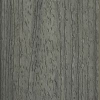 A close-up view of a textured gray surface resembling wood grain. The image highlights intricate vertical lines and grooves, creating a natural and rustic aesthetic. No visible text, logos, or numeric values are present.
