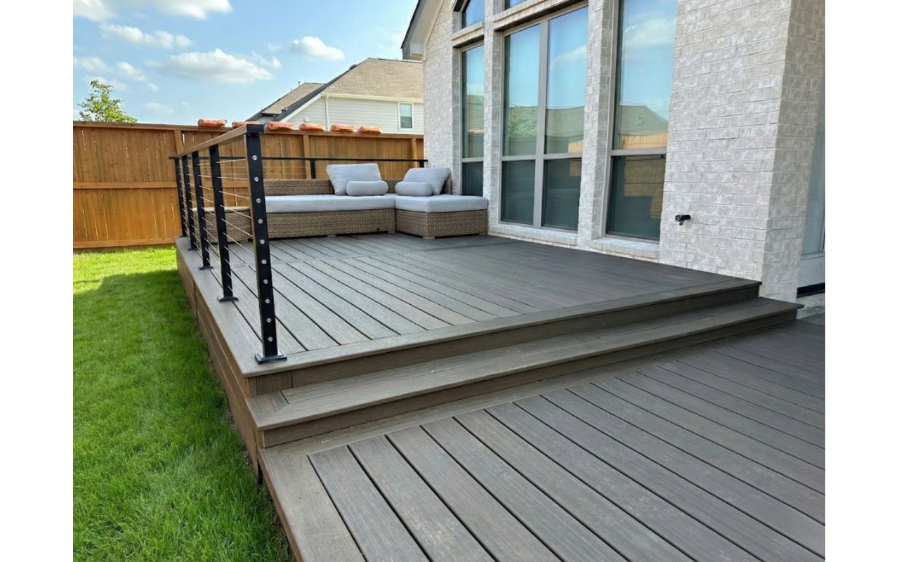 Multi-level Trex composite deck with integrated framing design. Built for both aesthetics and structural performance.