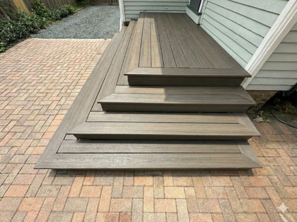 Custom composite deck steps with clean framing and modern finish. Designed for safety, durability, and visual impact in Houston outdoor spaces.