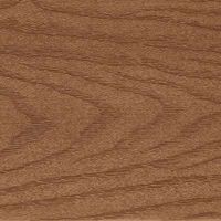 A detailed close-up of a natural brown wood grain surface is shown. The image highlights the organic lines and patterns typical of wood, with a warm, medium-brown color palette. There are no visible text, numbers, or branding elements present. The texture is evenly lit, emphasizing the natural material's tactile quality.
