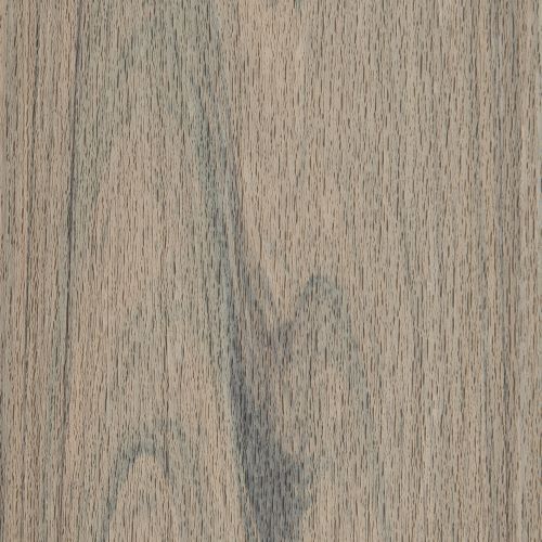 This image features a close-up view of a natural wood surface, showcasing its distinct grain patterns and subtle color variations. The wood displays a mix of light brown and grayish hues, with visible knots and streaks running vertically. The texture is matte and organic, making it suitable for backgrounds or design references. No visible text, numbers, or identifiable brands are present.