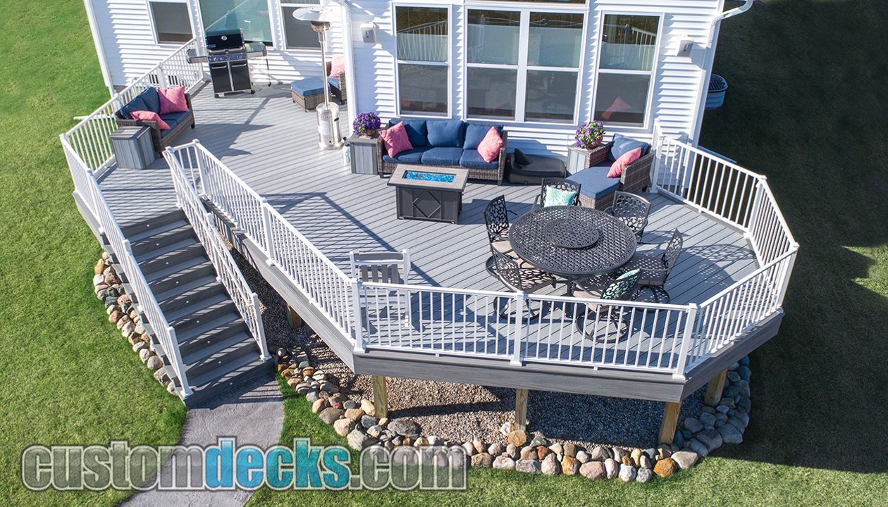 Enhance Foggy Wharf decking with Island Mist border and White Signature aluminum railing