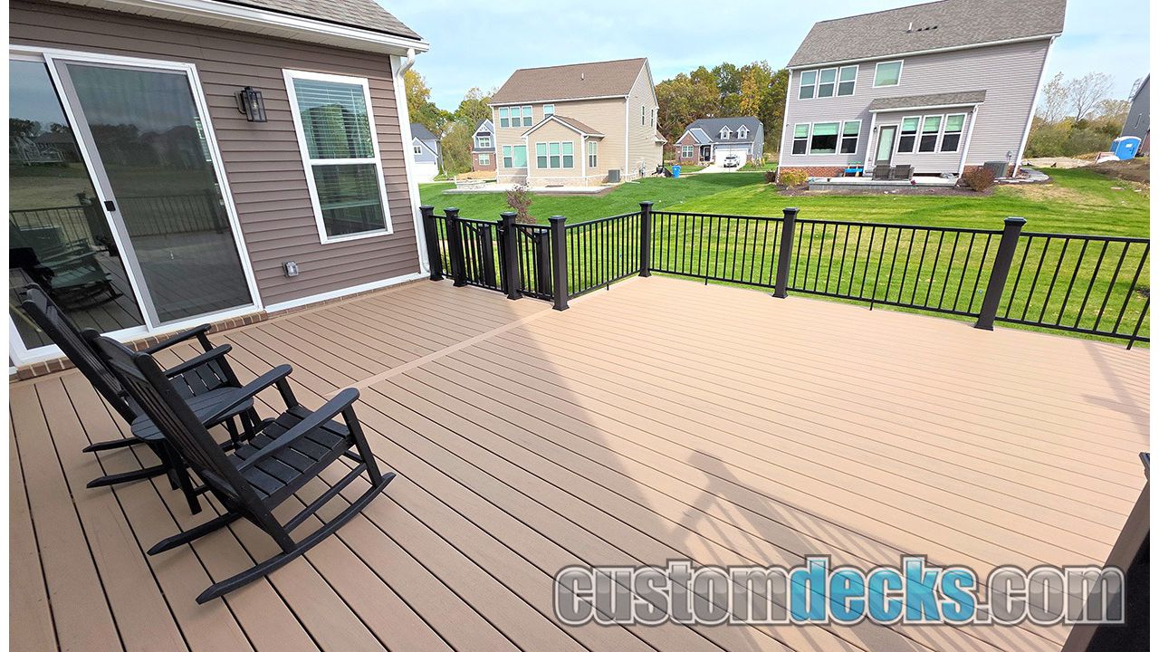 Lineage Carmel decking with Black Select Aluminum railing