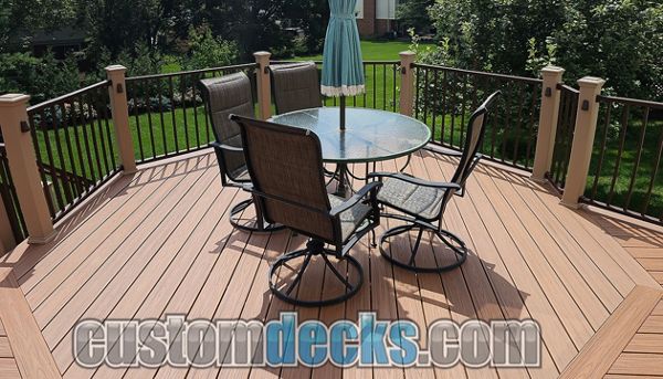 Transcends Tiki Torch decking with Bronze Signature railing and Wedge Lights